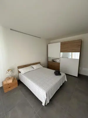 Letto o letti in una camera di B&B Bozzini's Nest