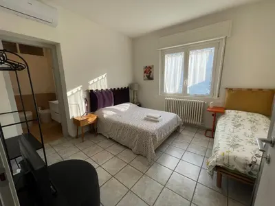 Letto o letti in una camera di Un mondo in pianura
