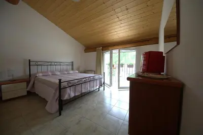 Letto o letti in una camera di Agriturismo Cascina Mezzulli