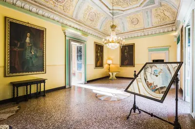 Letto o letti in una camera di Palazzo Barbò