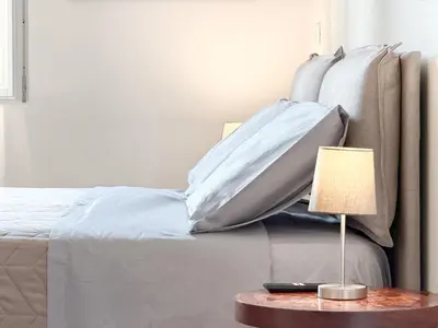 Letto o letti in una camera di Attico d'Autore in Piazza con Vista Ghirlandina