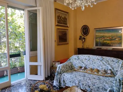 Letto o letti in una camera di Amarcorde Home in Corso Buenos Aires con 6 posti letto