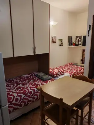 Letto o letti in una camera di Casa MINO PARMA