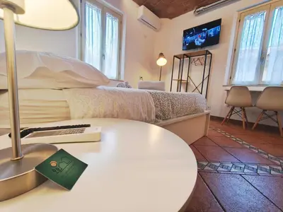 Letto o letti in una camera di Monolocale Modena con Parcheggio riservato pressi Clinica Fogliani e Centro Storico