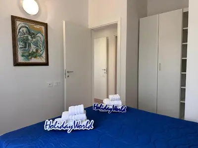 Letto o letti in una camera di Oltre il Mare by Holiday World