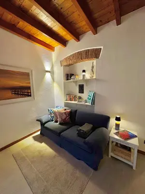 Area soggiorno di CASA BOSSA - Centro storico a 1 minuto dal mare