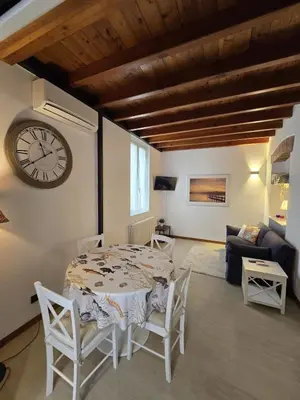 Area soggiorno di CASA BOSSA - Centro storico a 1 minuto dal mare