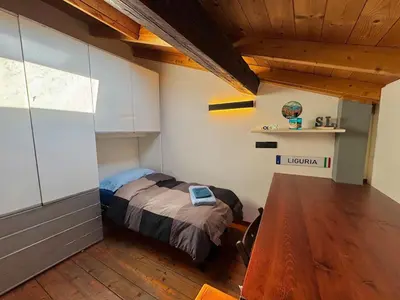 Letto o letti in una camera di CASA BOSSA - Centro storico a 1 minuto dal mare