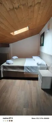 Letto o letti in una camera di OSTERIA IL BECCO FINE affittacamere