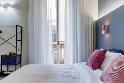 Letto o letti in una camera di Pallamaglio suites
