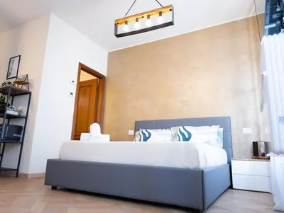 Letto o letti in una camera di Vrenozi 155 Appartamento centrale a due passi dall ospedale