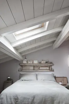 Letto o letti in una camera di Quartopiano Modena