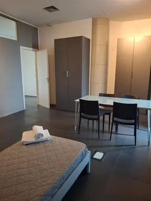 Letto o letti in una camera di Appartamento Mantova Residence