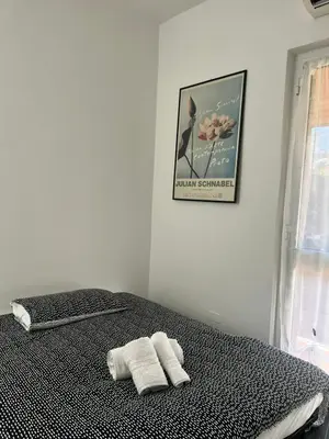Letto o letti in una camera di Arvasia City