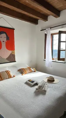 Letto o letti in una camera di Borgo 26 - Riviera Ligure & Cinque Terre