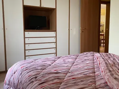 Letto o letti in una camera di Fior Di Sambuco