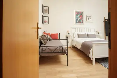 Letto o letti in una camera di Tra le case di Reggio - Pisacane