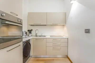 Cucina o angolo cottura di Cozy Loft - Via Emilia Est centro