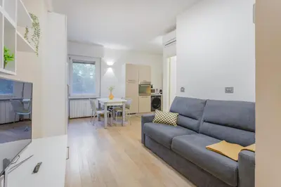 Area soggiorno di Cozy Loft - Via Emilia Est centro