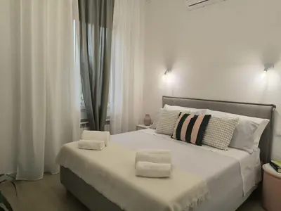 Letto o letti in una camera di Giulia