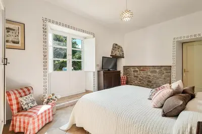 Letto o letti in una camera di Villa del ponte