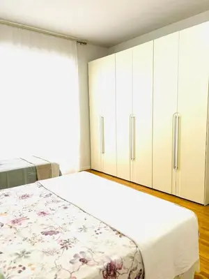 Letto o letti in una camera di Appartamento Crema centro