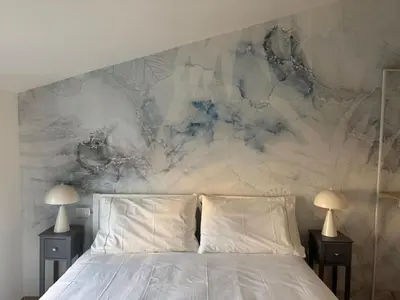 Letto o letti in una camera di Il Nido al Quinto - Dimore Damiano