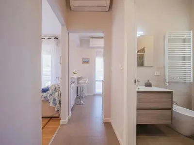 Letto o letti in una camera di Enrico