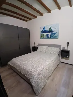 Letto o letti in una camera di BGO delle Colonne 22 Parma
