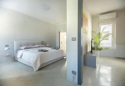 Letto o letti in una camera di Via Verdi Easy