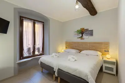 Letto o letti in una camera di Residence Brugnano