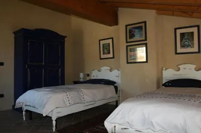 Letto o letti in una camera di SacreTerre B&B e Agriturismo