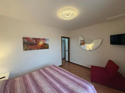 Letto o letti in una camera di Ami Affittacamere 3