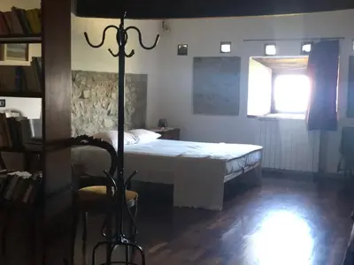 Letto o letti in una camera di B&B Il Tempo Ritrovato