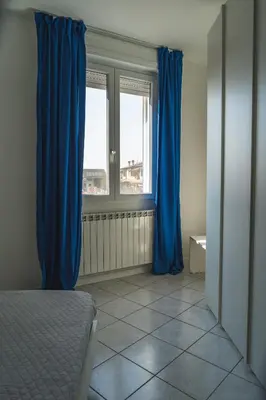 Letto o letti in una camera di WowMilano Escape