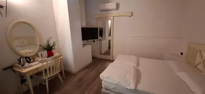 Letto o letti in una camera di La Colombera Ristorante - Albergo