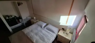Letto o letti in una camera di La Colombera Ristorante - Albergo