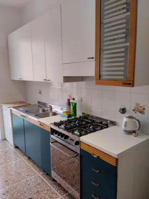 Cucina o angolo cottura di Great holiday appartamento moderno comodo a centro e spiagge
