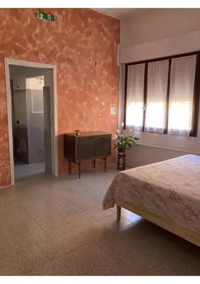 Letto o letti in una camera di Portale dei Soli 2