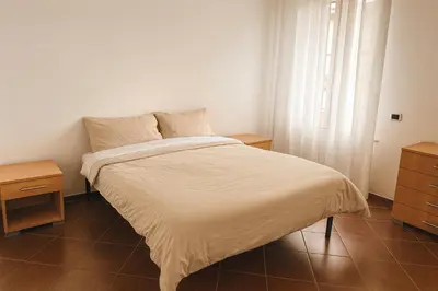 Letto o letti in una camera di Palazzo Gregorio