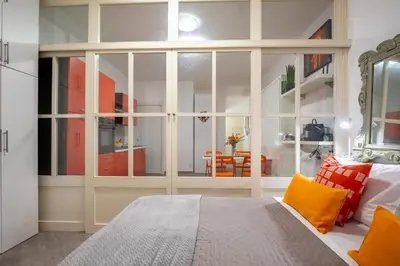Letto o letti in una camera di Le Finestre su Via Veneto
