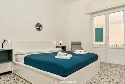 Letto o letti in una camera di Tik Tok, TerreMarine