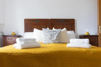 Letto o letti in una camera di 306 - Casa San Bernardino, Relax nel verde di Sestri, A 10 minuti di auto dal Centro e dal Mare