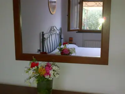 Letto o letti in una camera di Apartment Wohnung mit Terrasse mit Meerblick by Interhome