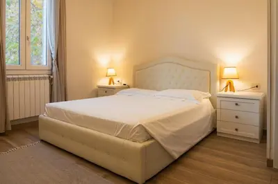 Letto o letti in una camera di Emilia Suite Home