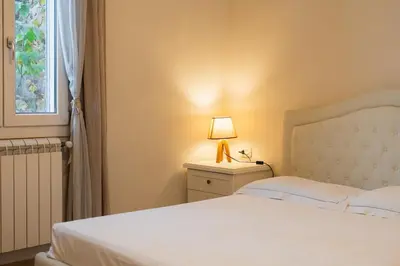 Letto o letti in una camera di Emilia Suite Home
