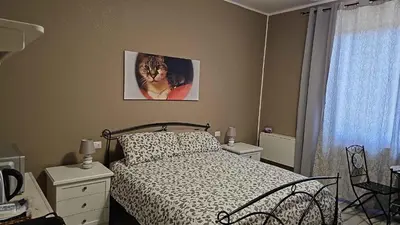 Letto o letti in una camera di beb MUFFIN
