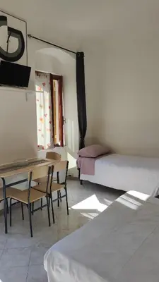 Letto o letti in una camera di Residenza Vittoria
