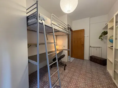 Letto o letti in una camera di Casa Mimosa a 2 Passi dal Mare con Garage