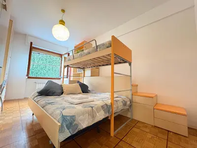 Letto o letti in una camera di Casa Mimosa a 2 Passi dal Mare con Garage